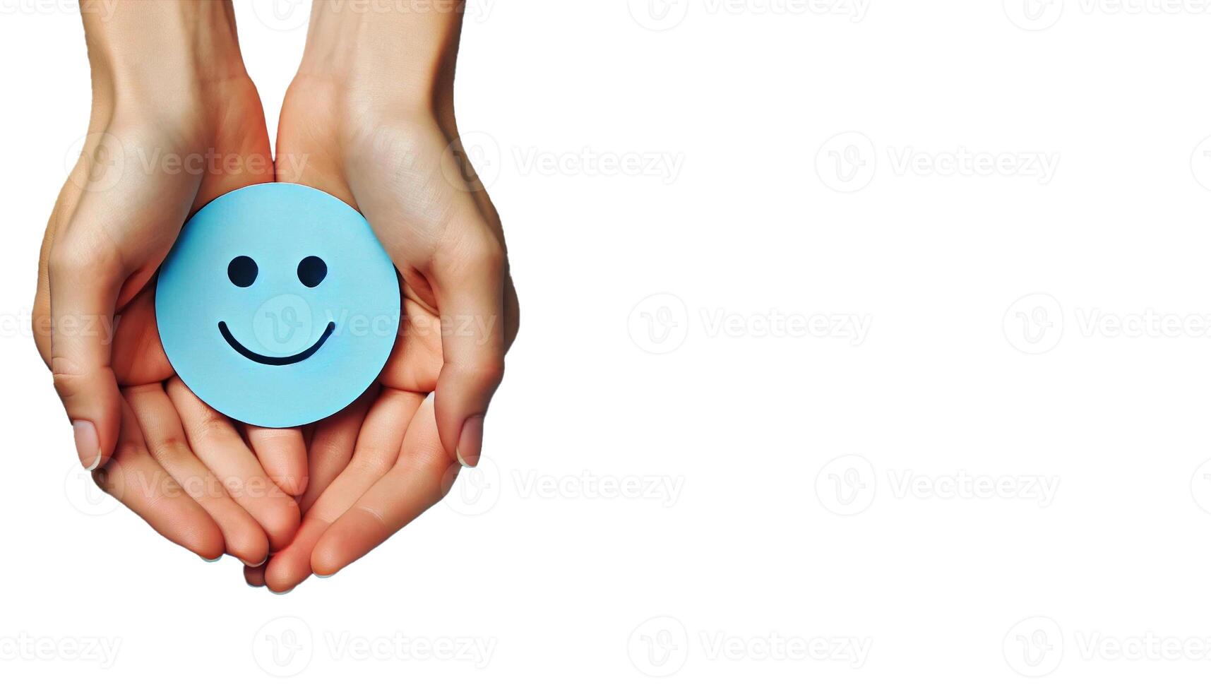 A pair of hands gently holding a blue circle with a simple, happy face drawn on it on white background photo