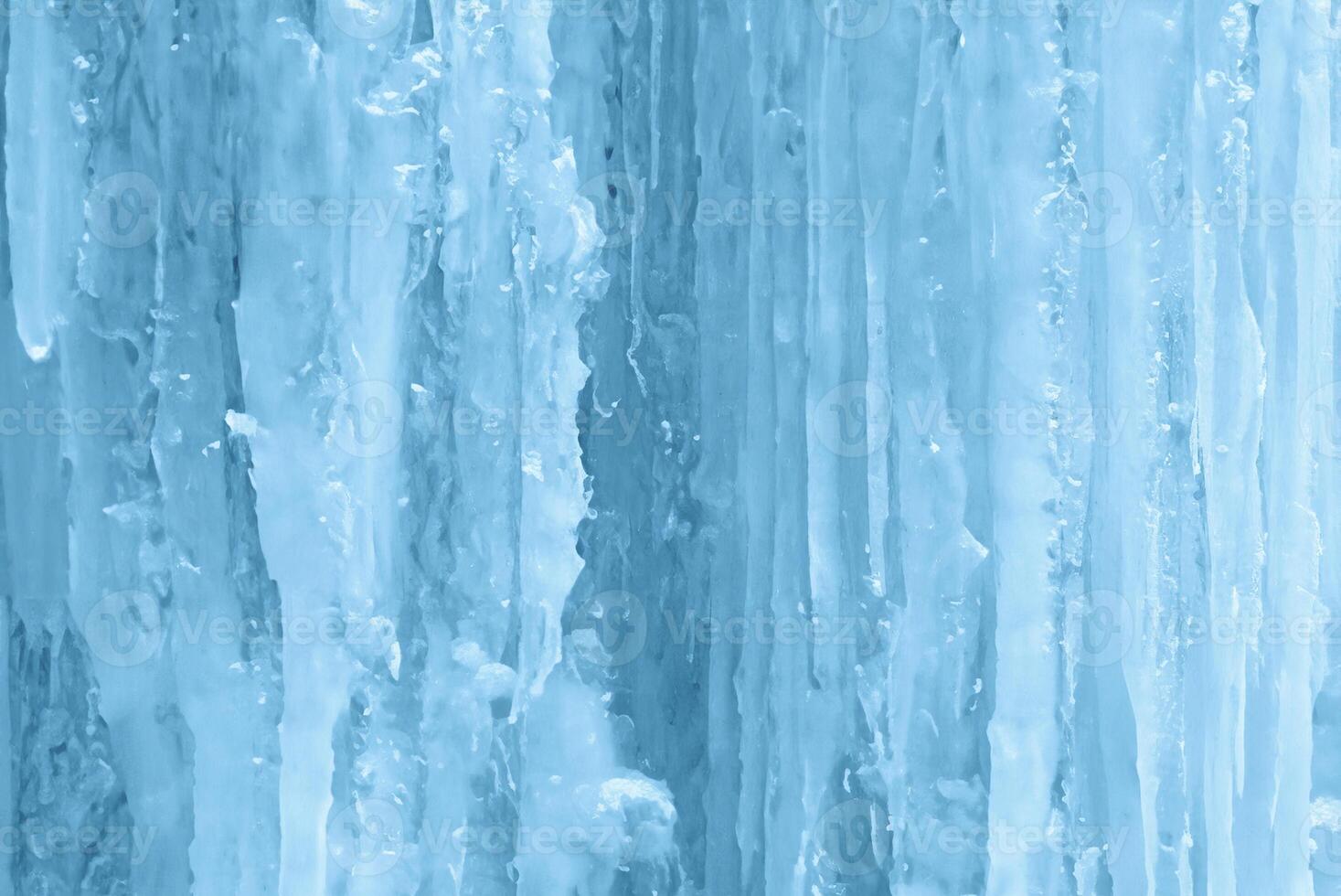 Frozen Waterfall with Hanging Icicles, Serene Winter Nature Background photo