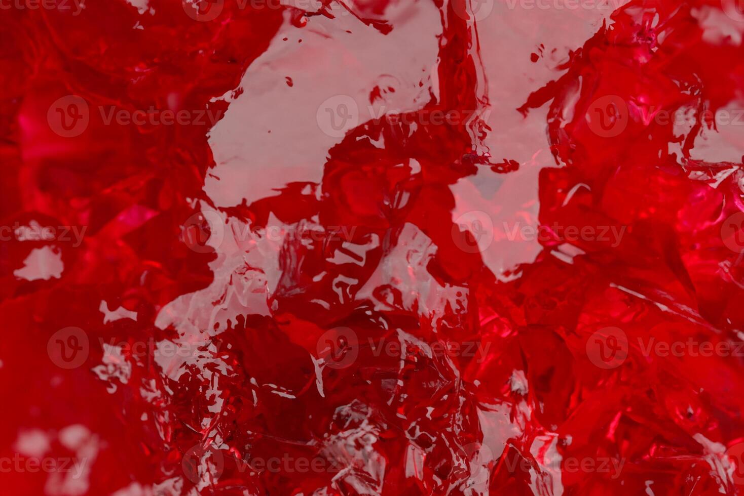 Macro Shot of Fresh Strawberry Jelly Spread on White Surface photo