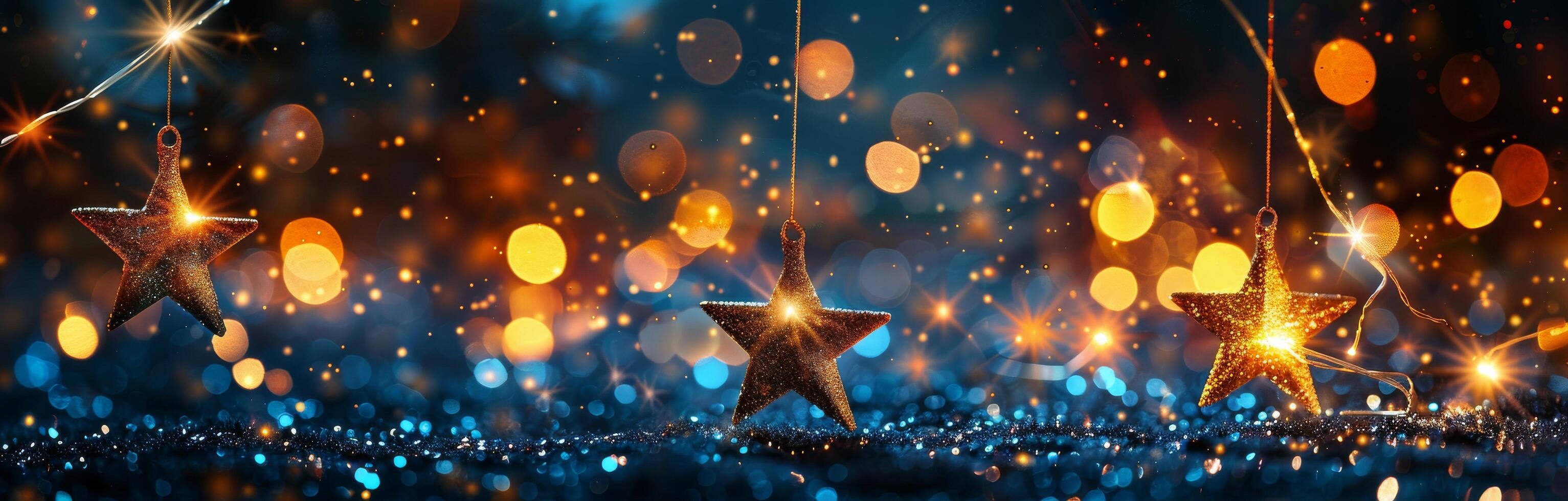 Golden Star Ornaments Hanging Against a Blurred Background of Lights photo