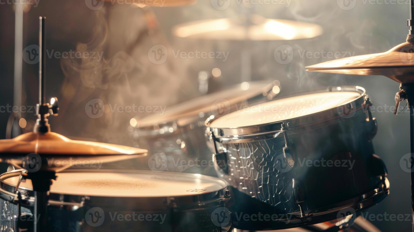 Close-up of a drum set with smoke and light photo