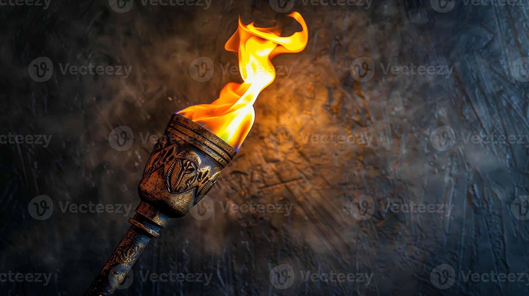A close-up shot of a burning torch against a textured background photo