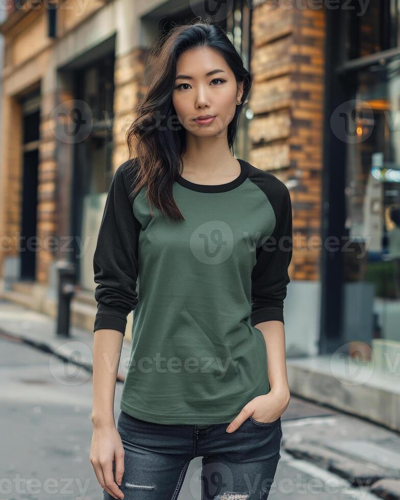 Woman in a green and black raglan shirt photo