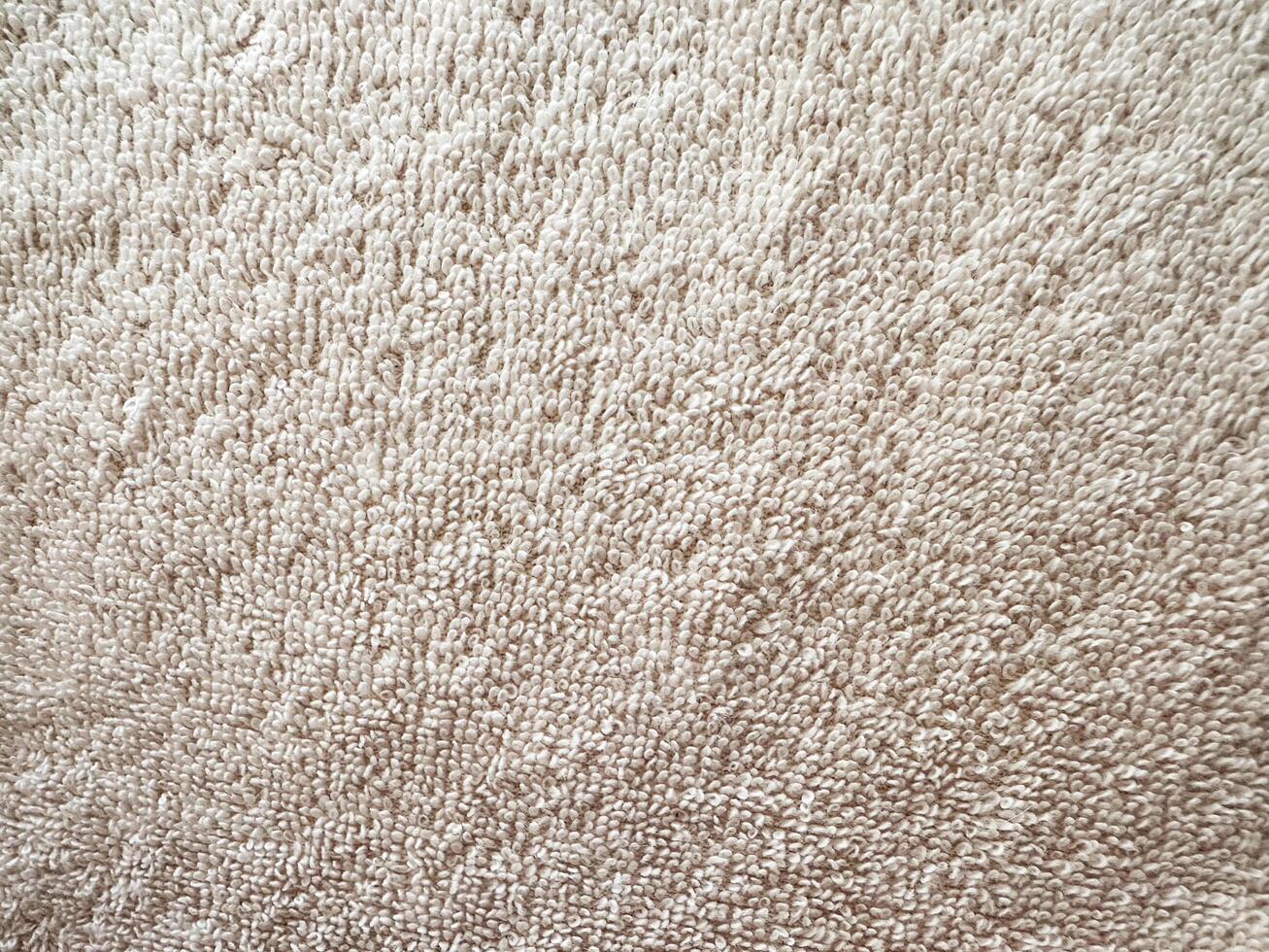 Top view of cotton terry towel pattern. Bathrobe. Health, hygiene and cleanliness. Household, bath, hotel, spa concept photo