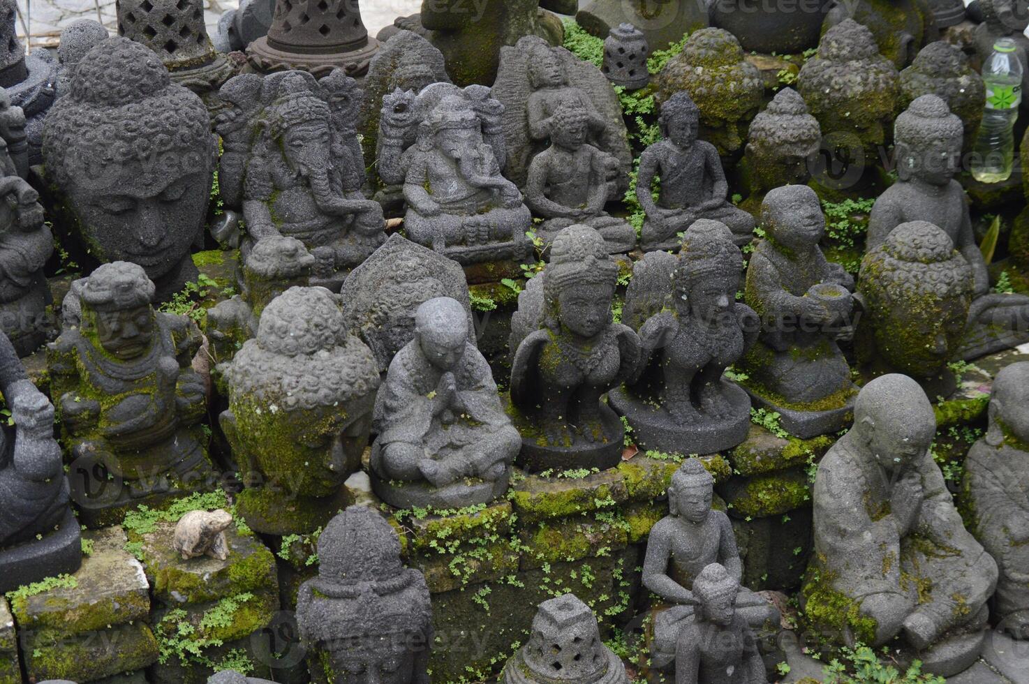 Carving crafts from Buddhist stone relics around Mendut temple photo