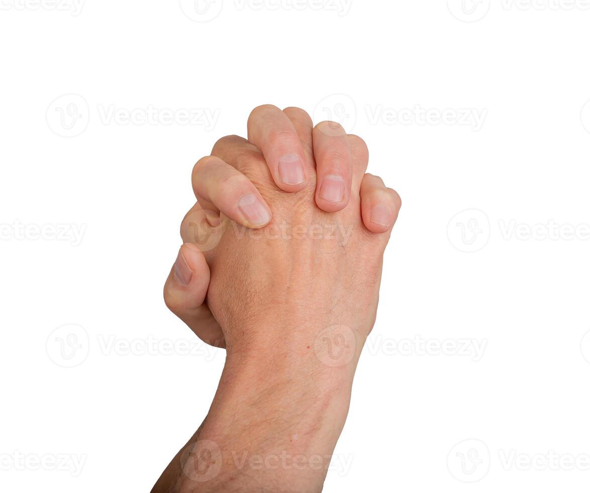 Hands intertwined, fingers clasped in prayer unity gesture. Entwined close up, white background. photo