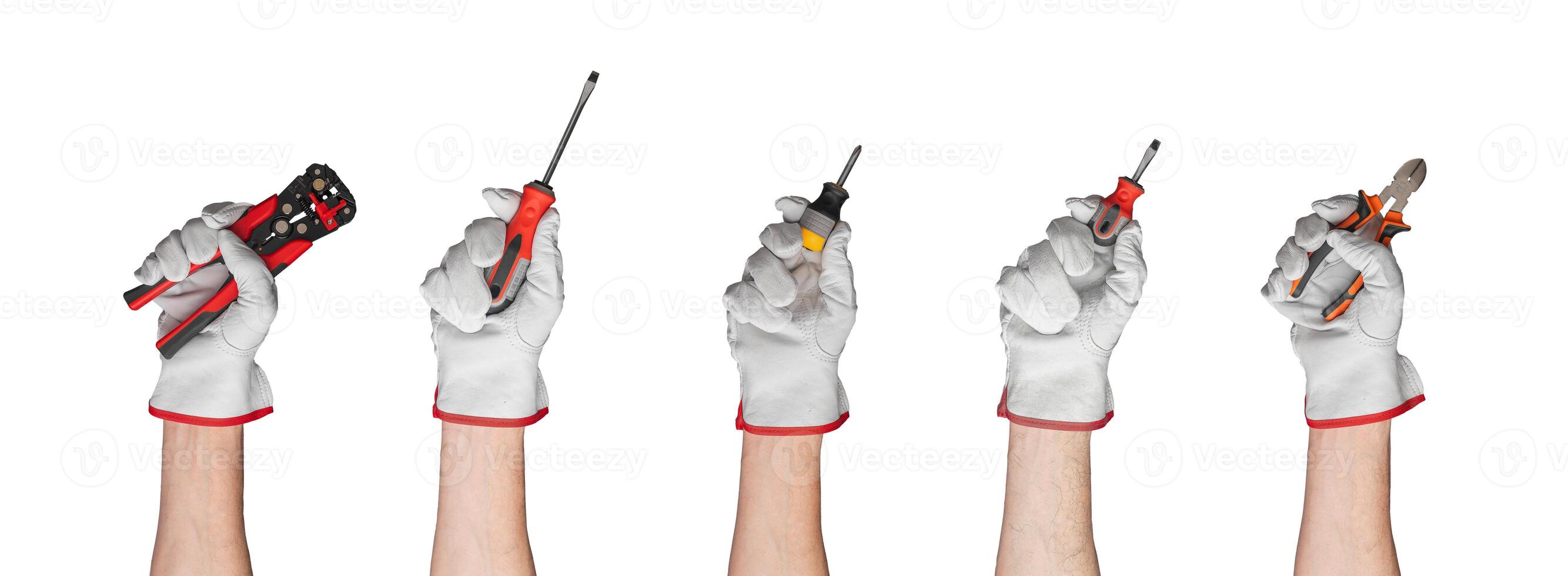 Assorted hand tools including screwdrivers, pliers, and crimping tool. Essential for construction, photo