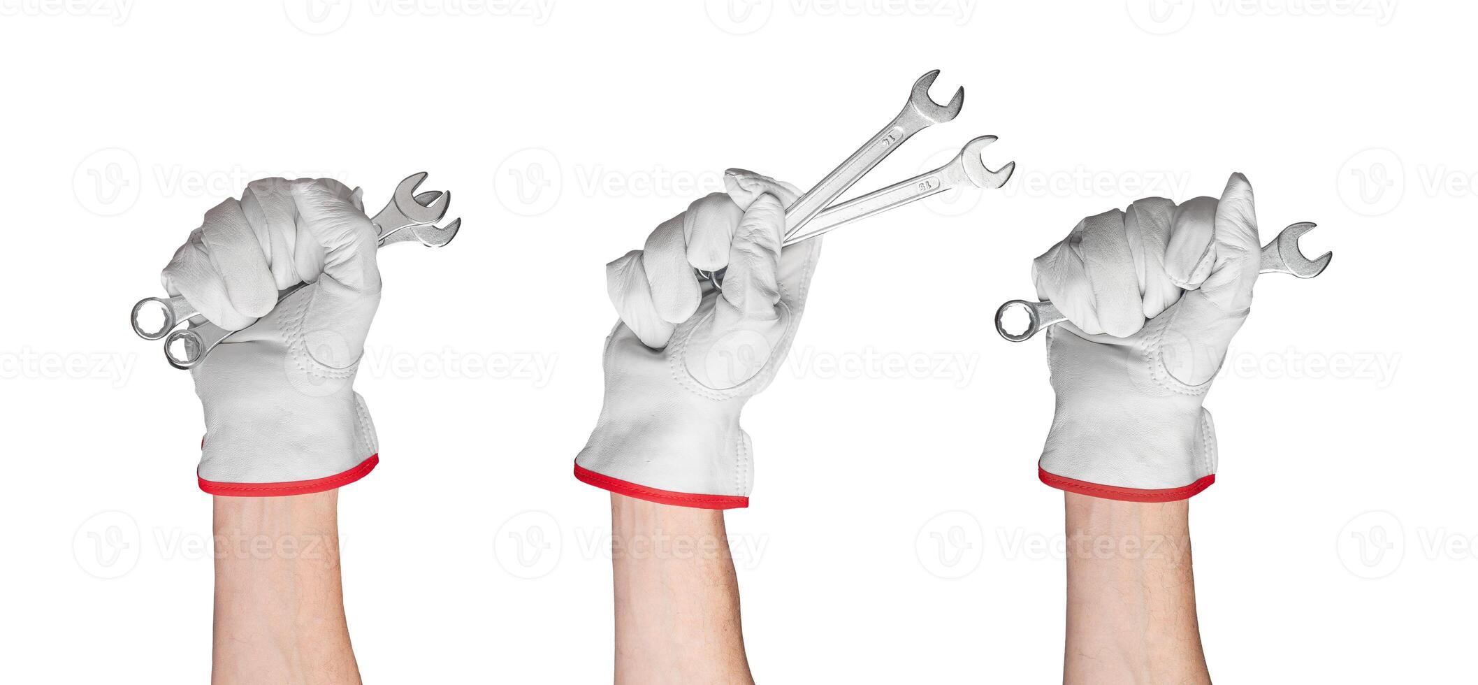 Close up of a hand holding a spanner. Handy repair tool set for fixing. Isolated on white background photo