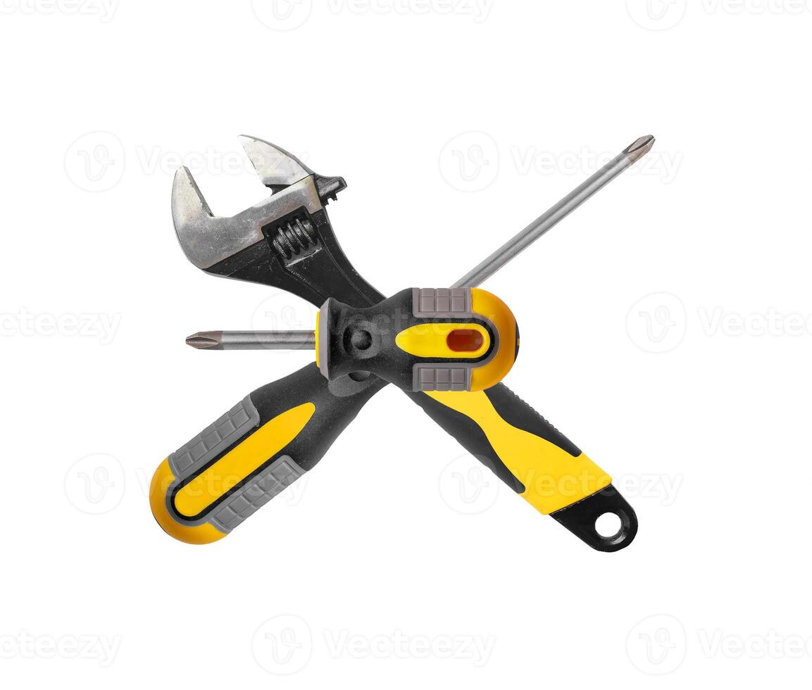 Isolated metallic tools including pliers and wrenches. Essential for repair and construction work. photo