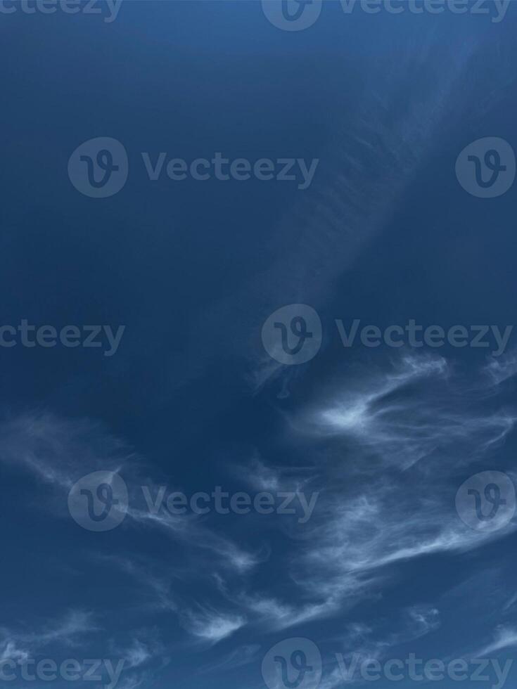 Blue Sky with Fluffy White Clouds Scattered Across It. Serene Landscape that Stretches to the Horizon, Mesmerizing Meteorological Phenomenon. High quality photo
