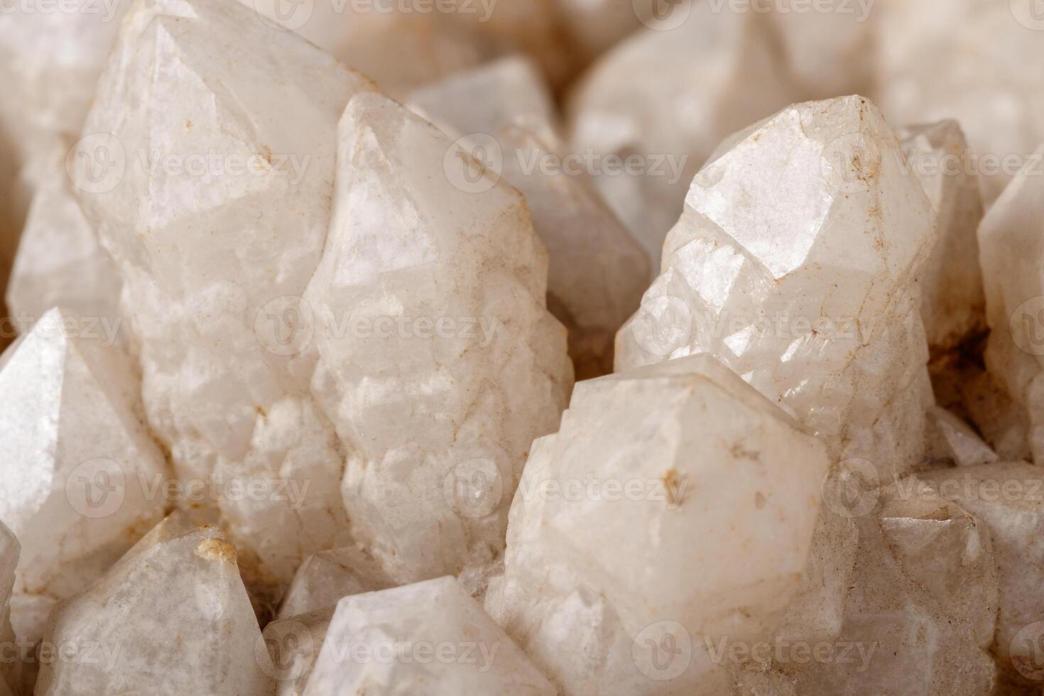 Macro Mineral Snow quartz Crystals on Black Background photo