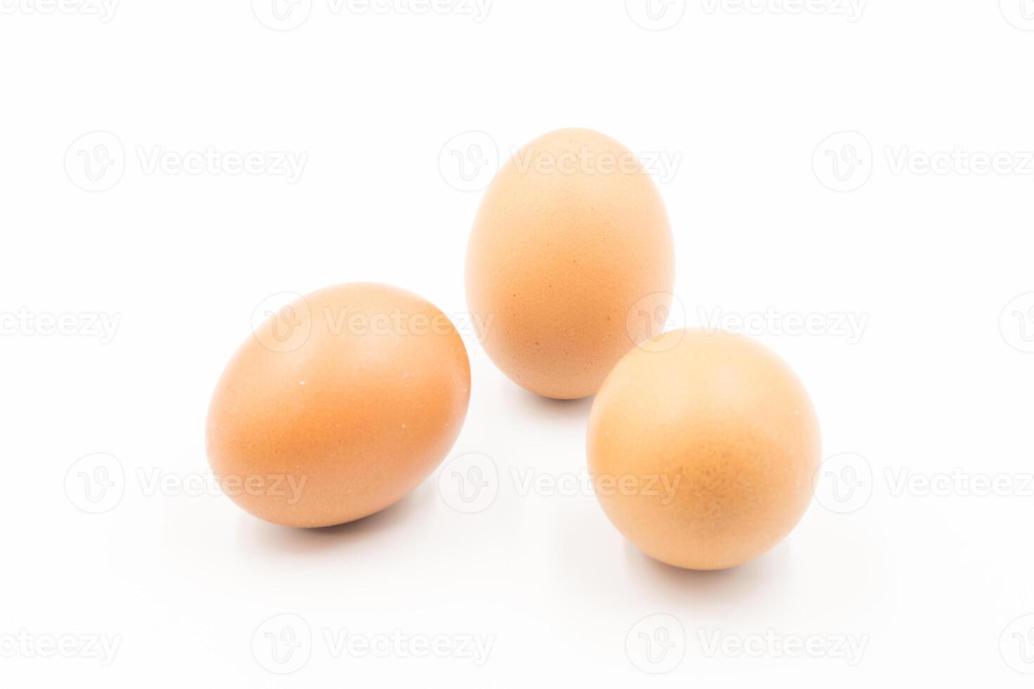 Chicken eggs on white background, egg isolated on the white background, Close-up view of raw chicken eggs, chicken egg isolated on white background, Raw eggs on white background photo