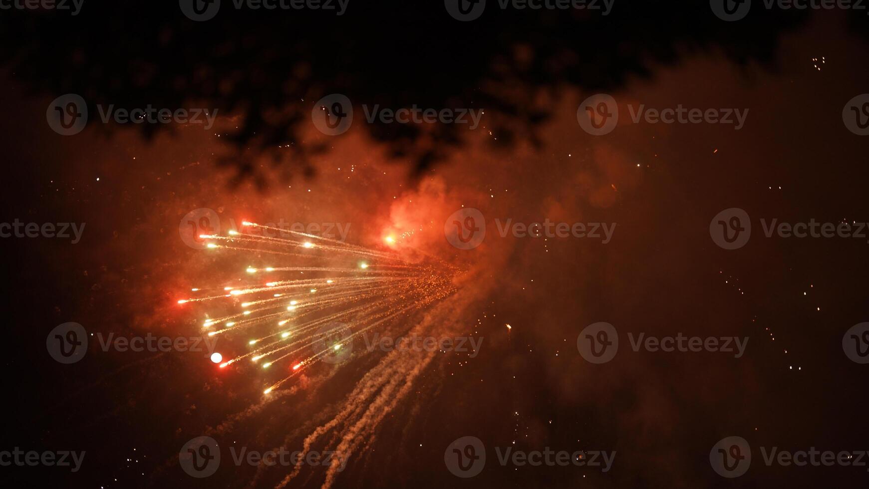 The beautiful and colorful fireworks show for new year's celebration at night photo