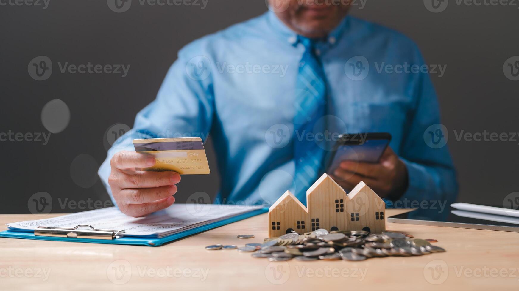 The businessman secured a mortgage loan to buy a house, viewing the property as a smart investment in real estate, blending business acumen with personal finance goals. photo