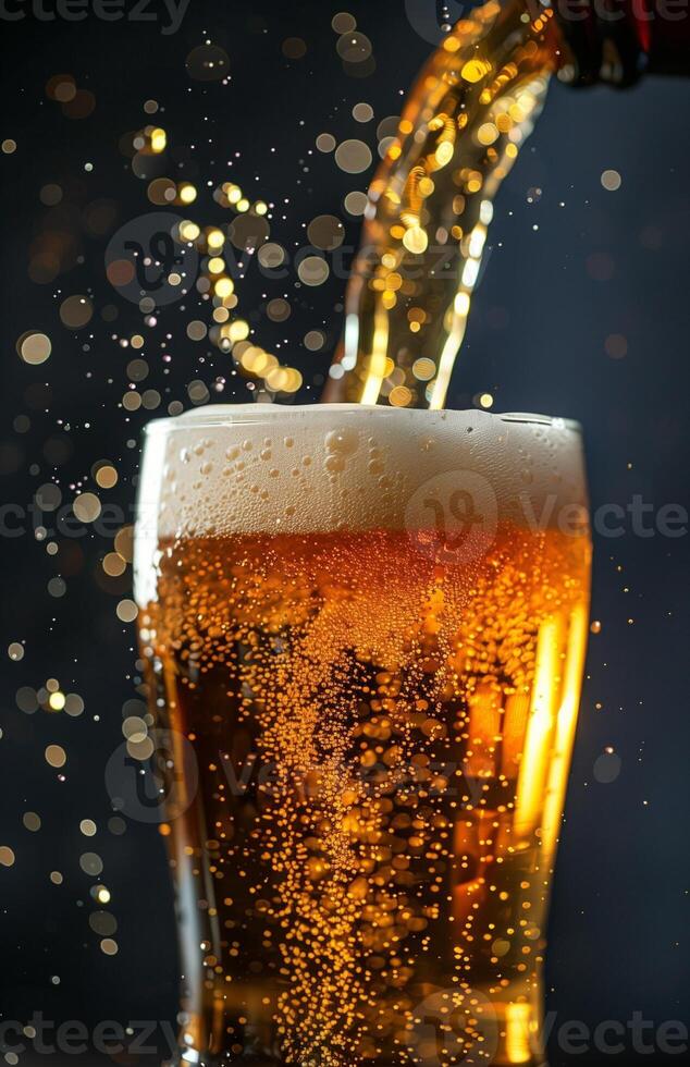 Pouring a glass of golden beer, creating a frothy head, ready to be enjoyed photo