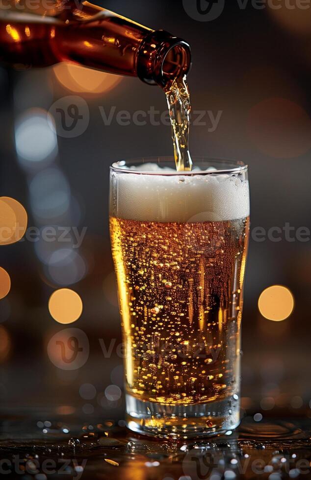 Pouring a glass of golden beer, creating a frothy head, ready to be enjoyed photo