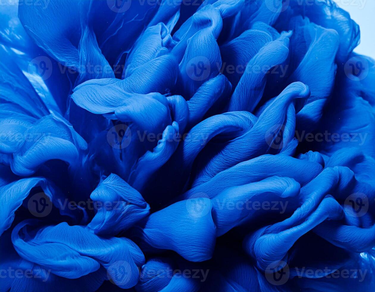 a close up of a blue abstract flower shaped object photo