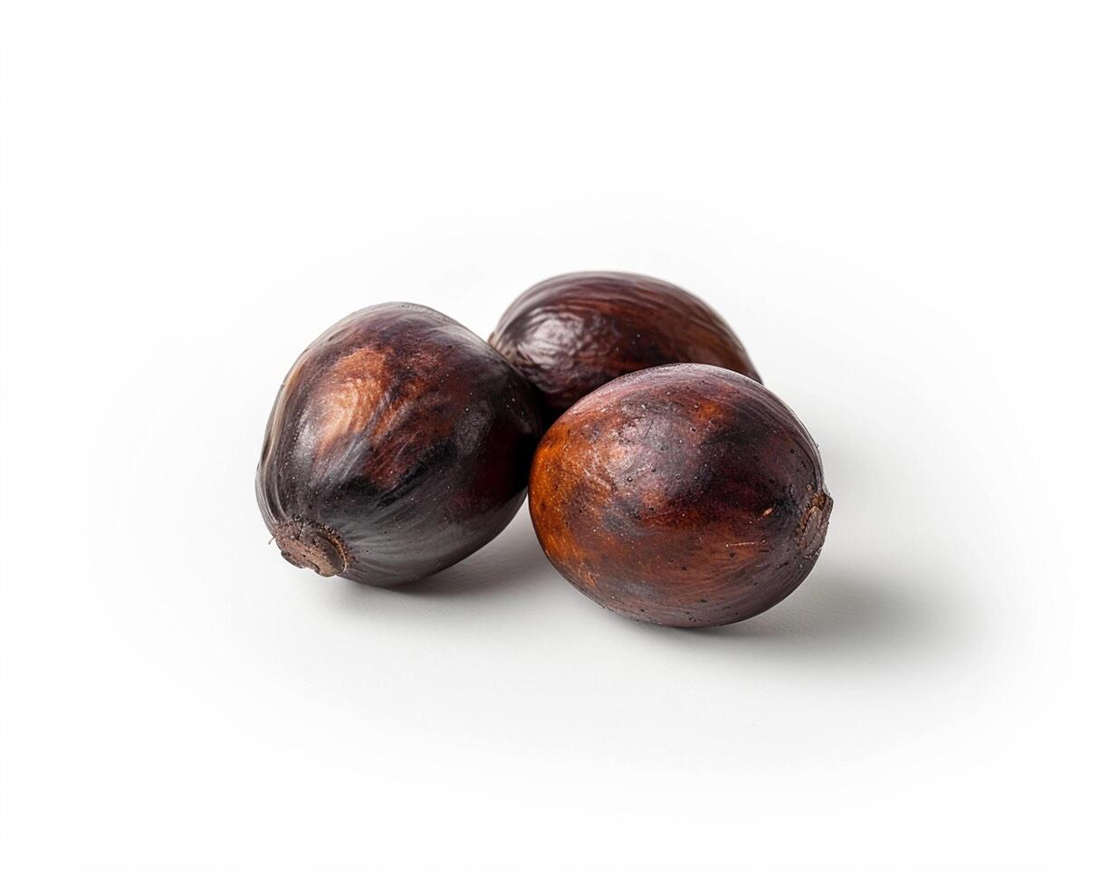 Three chestnuts on a white background photo