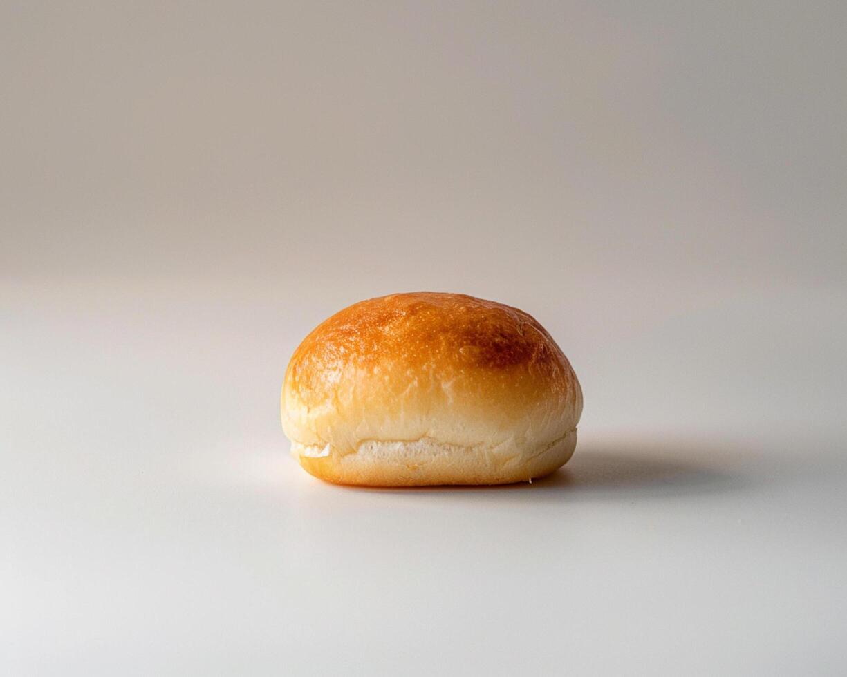 Small Bun on a White Surface photo