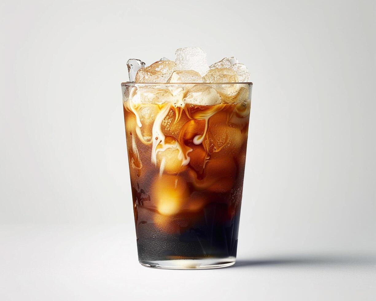 an iced coffee with ice and ice cubes photo