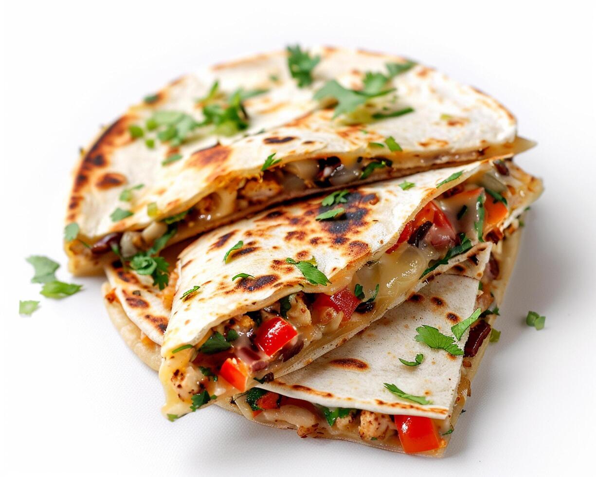 a stack of quesadillas with vegetables and cheese photo