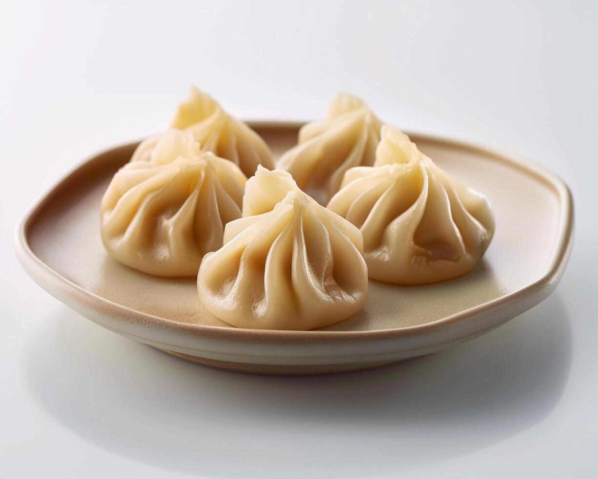 Plate with Four Dumplings on It photo