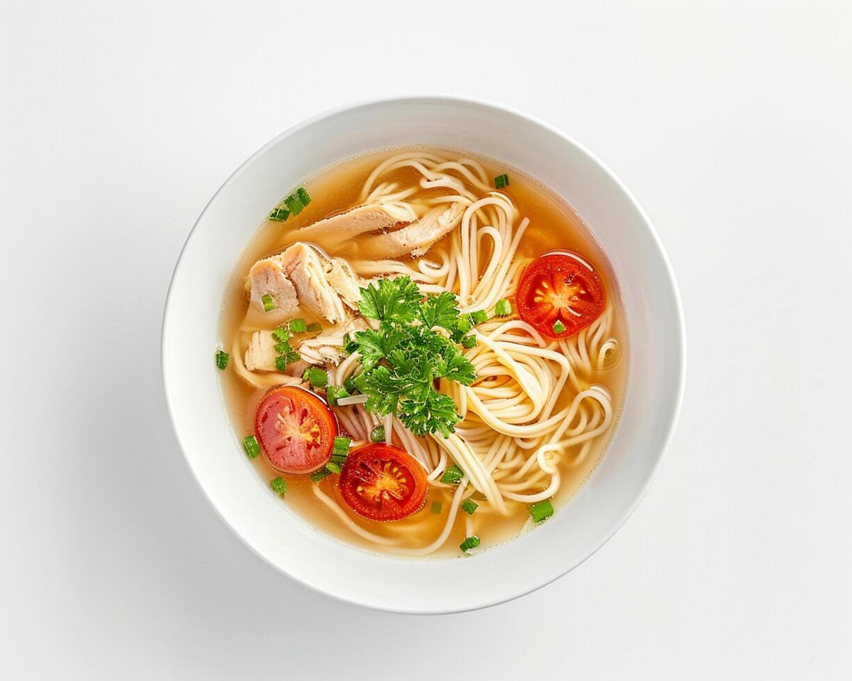 Chicken Noodle Soup with Tomato and Herbs in a Bowl photo