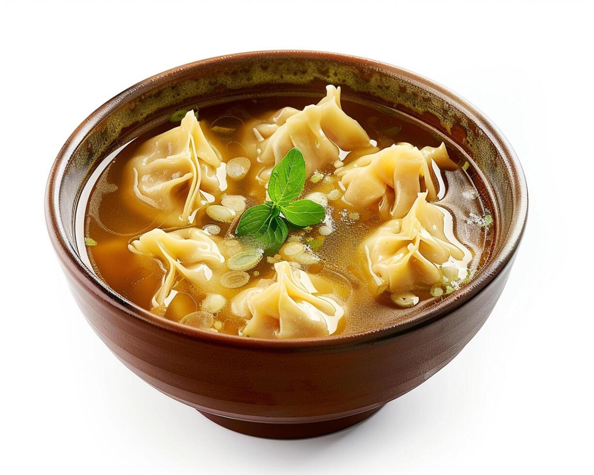 A Bowl of Soup with Dumplings in It photo