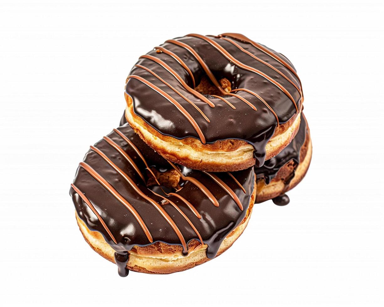 three chocolate covered donuts photo