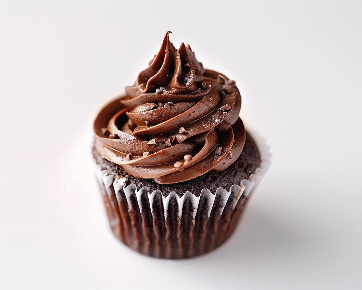 a chocolate cupcake with frosting on top photo