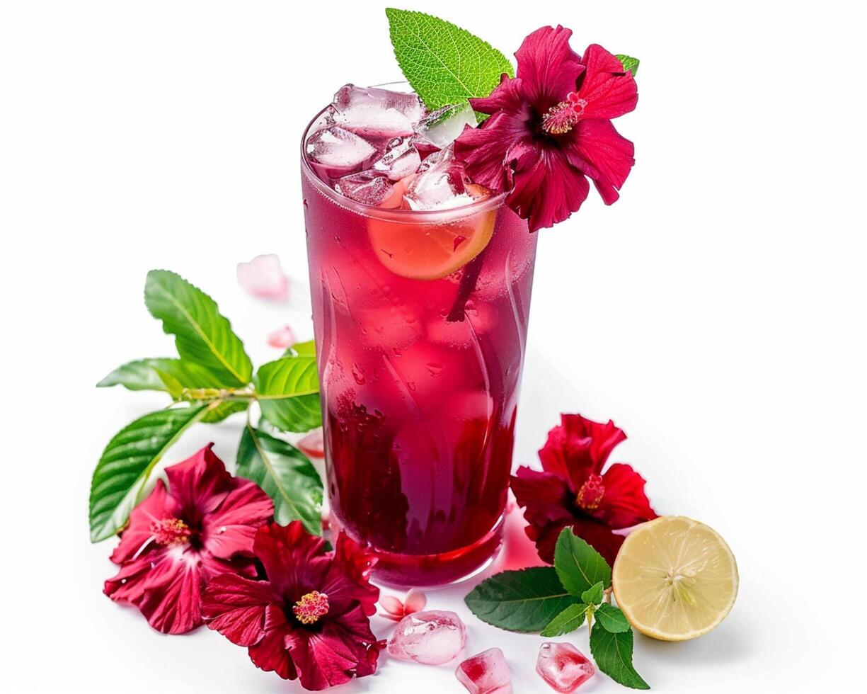 a glass of red drink with a hibiscus flower photo