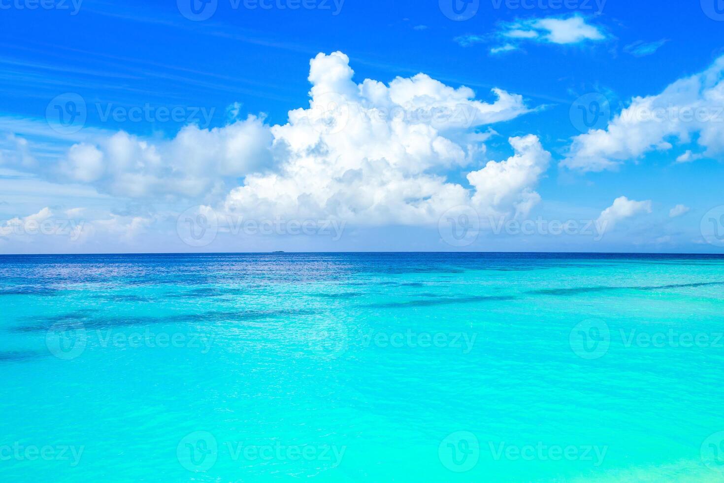 Beautiful sunny landscape of the turquoise crystal clear Indian Ocean photo