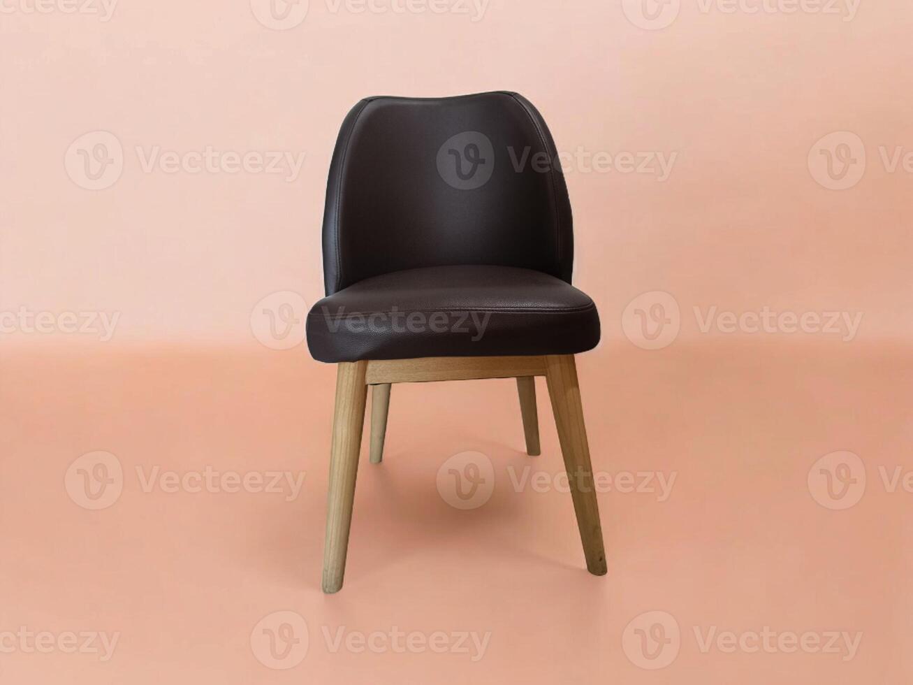 Empty chair againts the wall photo