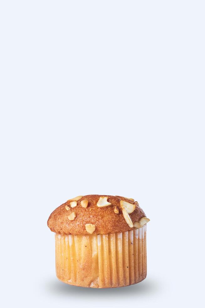 Almond muffin isolated on white background. photo