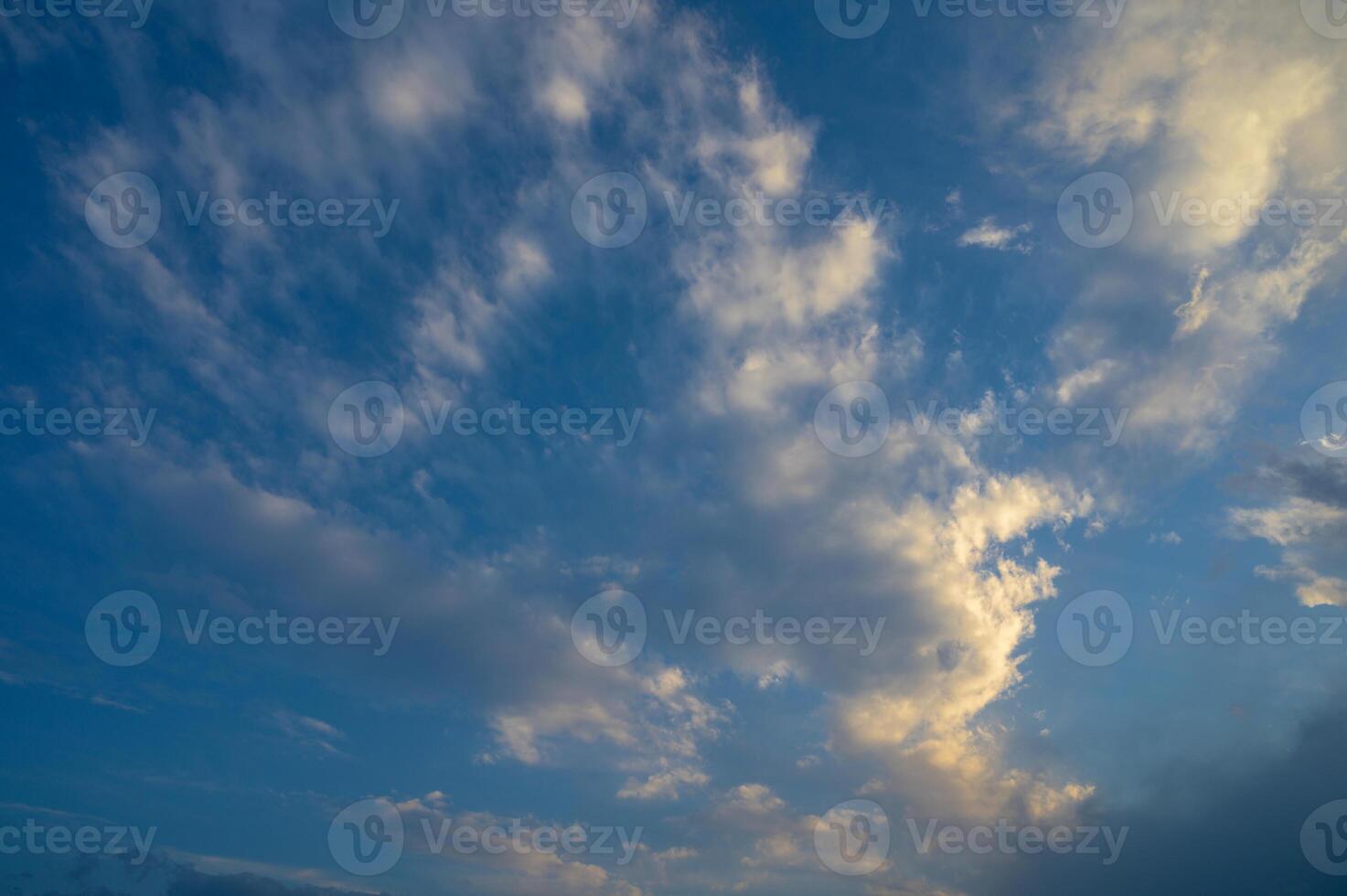The gathering clouds during sunset create abstract painting patterns in the western sky. 2 photo