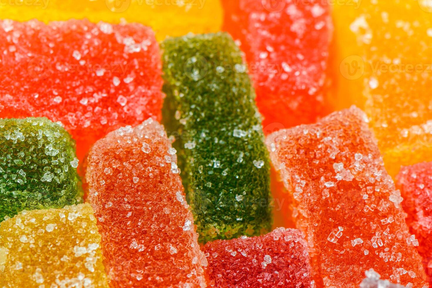 Sweet delicious multi-colored marmalade or jelly candies assorted in sugar sprinkles photo