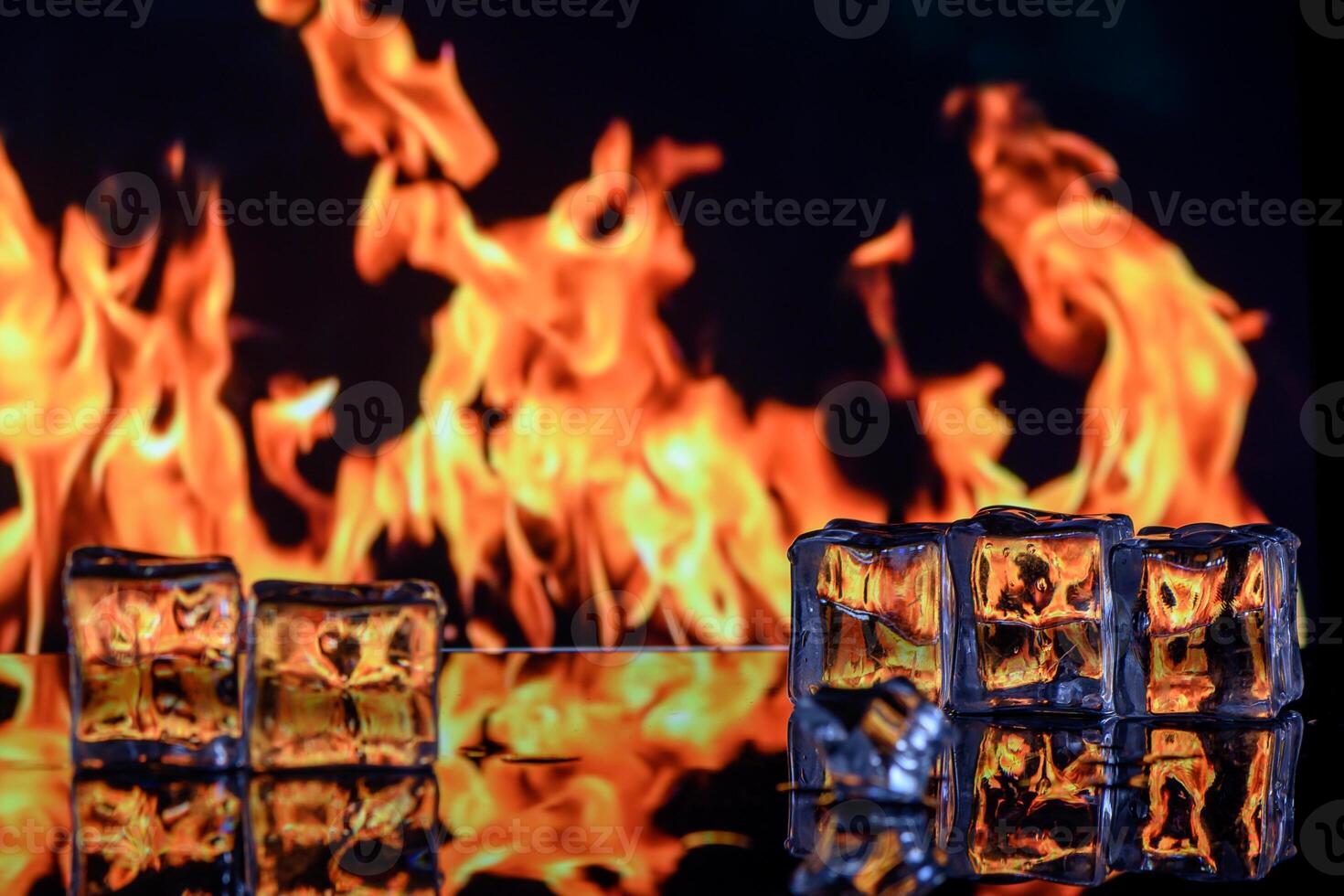 studio photography of a burning ice crystal and smoke in black reflective back 1 photo