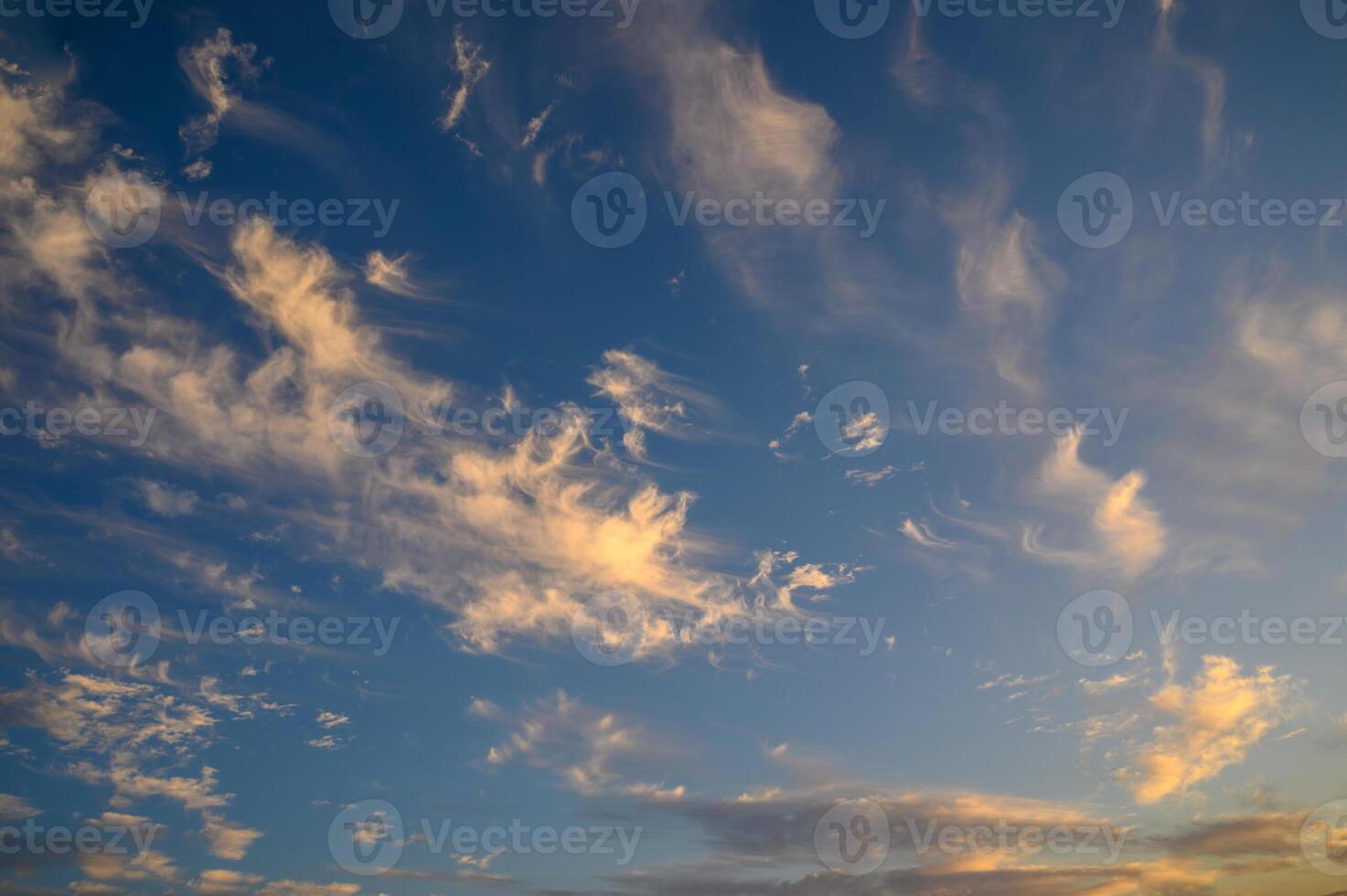 Colourful sunset sky. Full frame view of wispy colourful clouds up in the sky during sunrise or sunset hour 2 photo