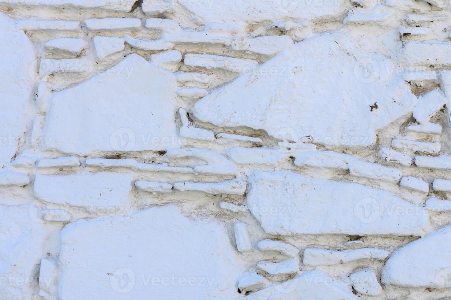 Ancient wall with peeling plaster. Old concrete wall, panoramic textured background 2 photo