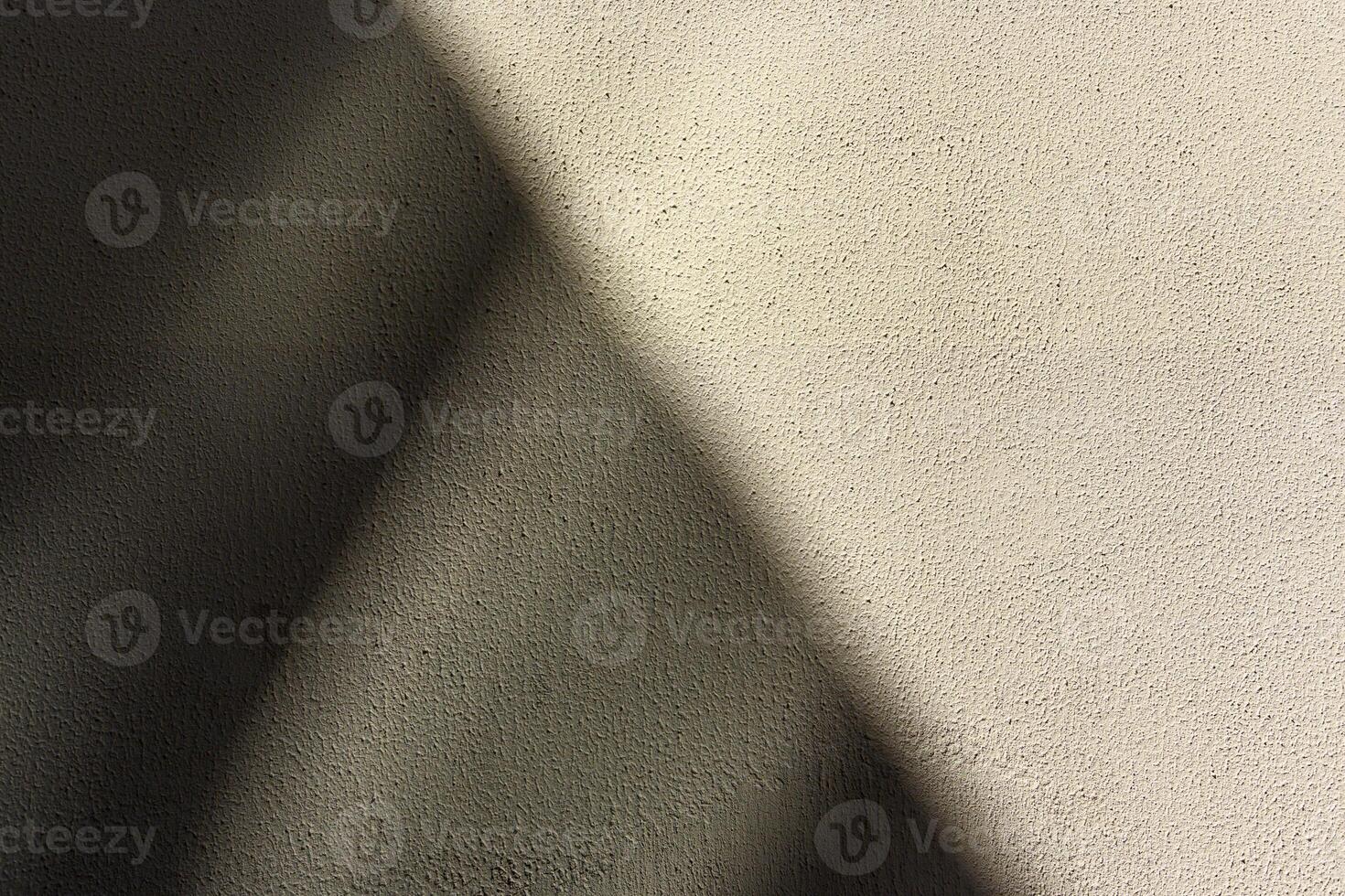 Full frame of a bright sunny orange wall with shadows and texture background photo