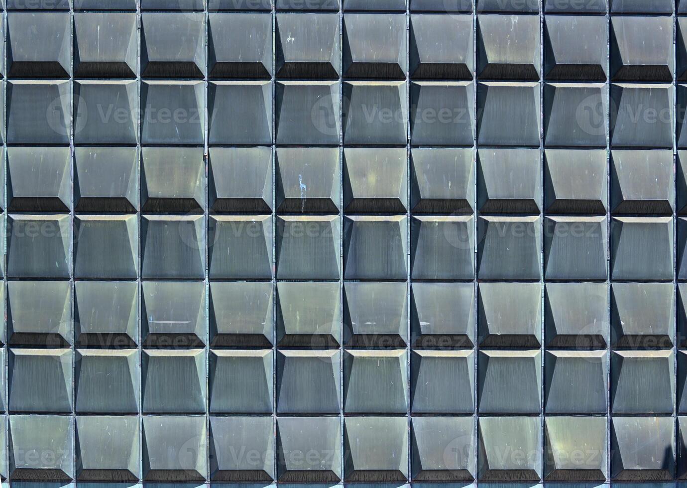 figured metal siding on the wall as a background 1 photo