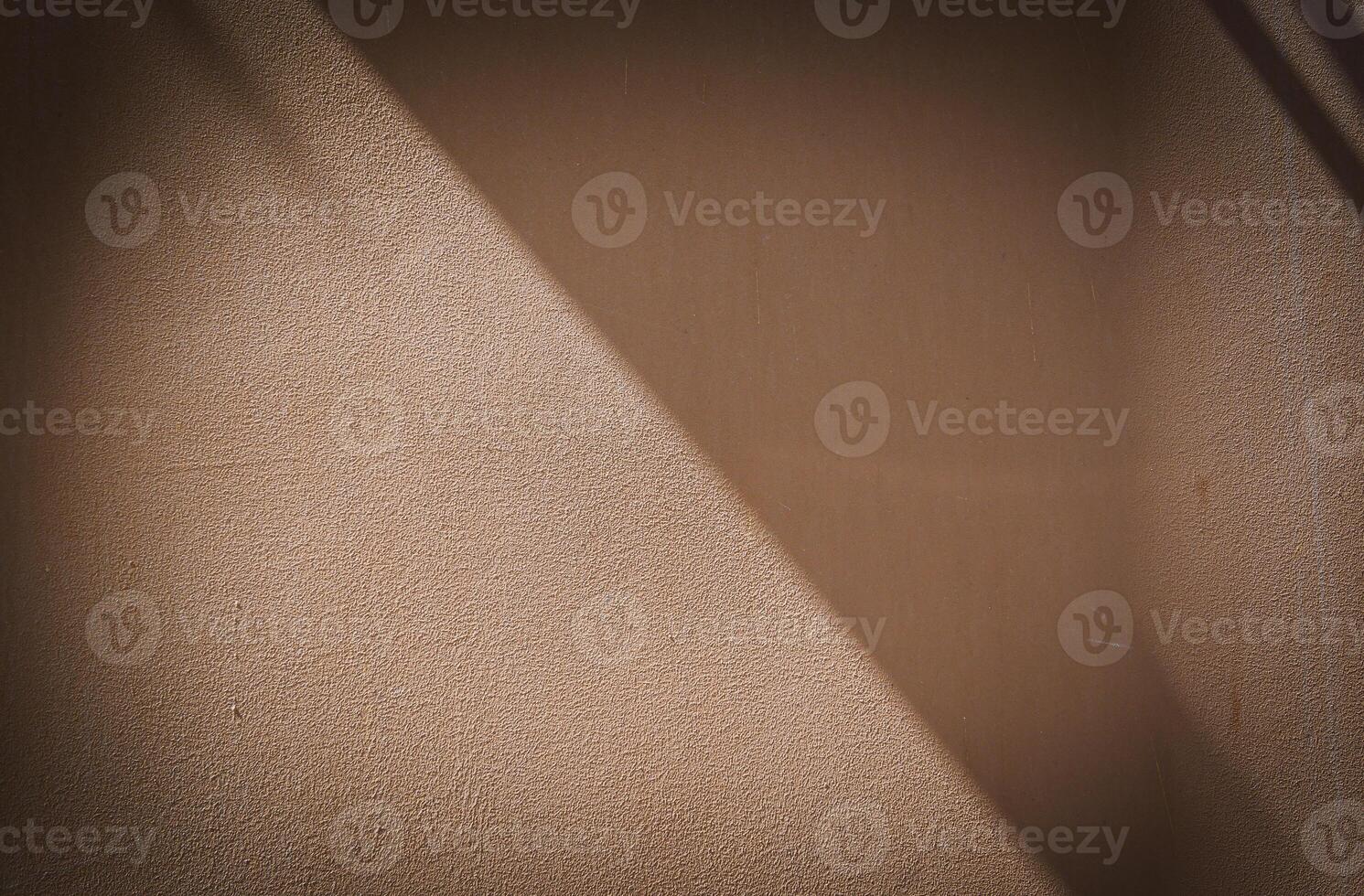 Old wall texture cement brown background abstract dark color.Dark Vignette Border Wallpaper photo