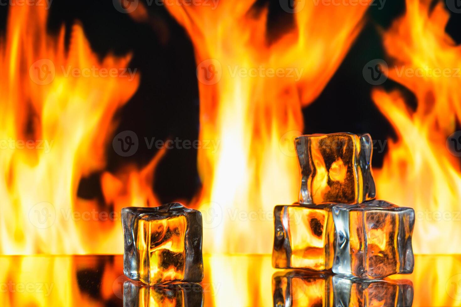 fire and ice cubes on a black background, place under the text photo