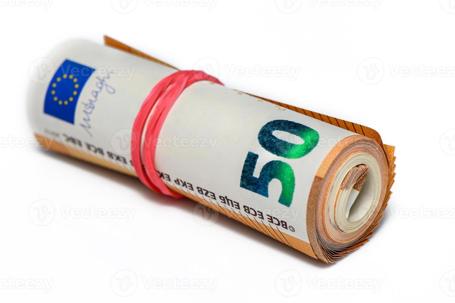 Close-up of a bundle of fifty euro bank notes bound with rubber band photo