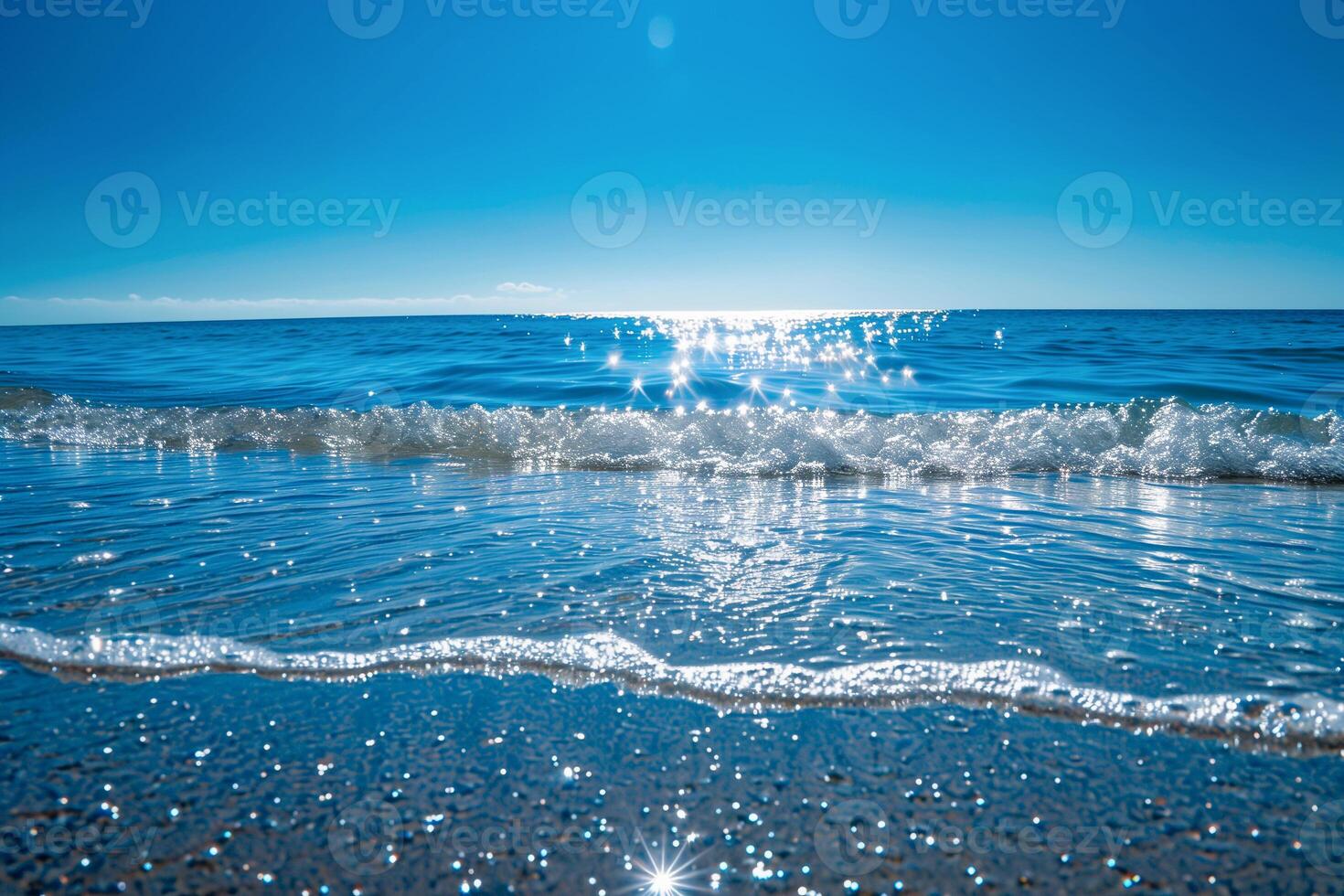 Sparkling blue sea under a clear sky, symbolizing peace and freedom photo