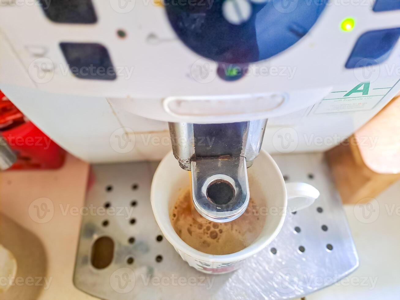coffee machine. Process of preparation of an espresso. Photo on long exposure.