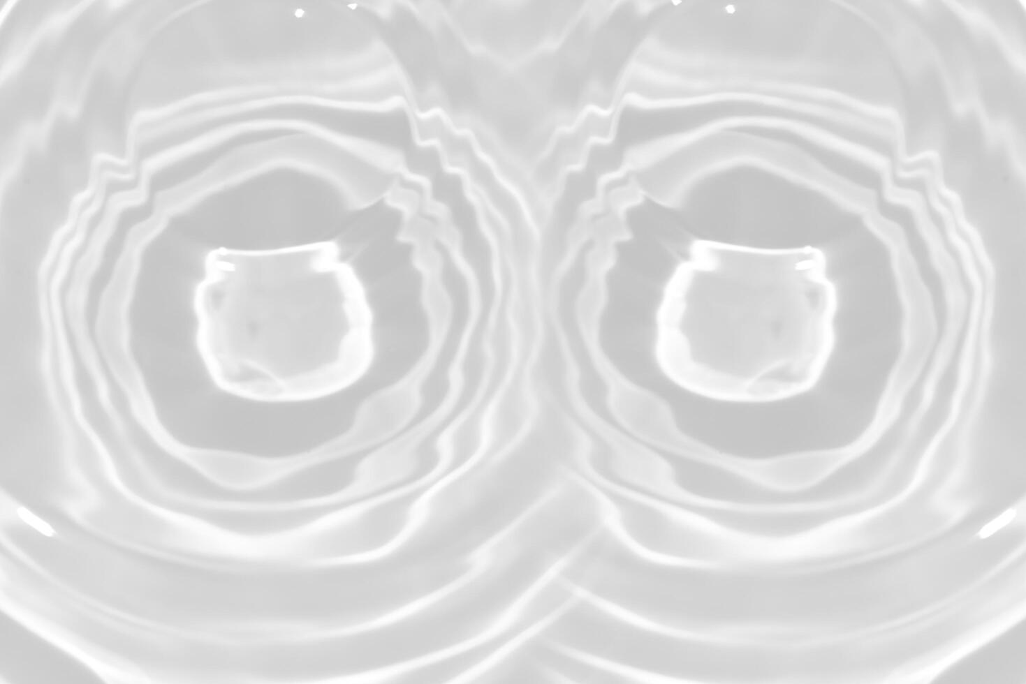Bluewater waves on the surface ripples blurred. Defocus blurred transparent blue colored clear calm water surface texture with splash and bubbles. Water waves with shining pattern texture background. photo