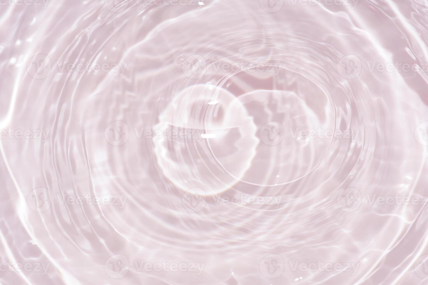 Blue water with ripples on the surface. Defocus blurred transparent blue colored clear calm water surface texture with splashes and bubbles. Water waves with shining pattern texture background. photo