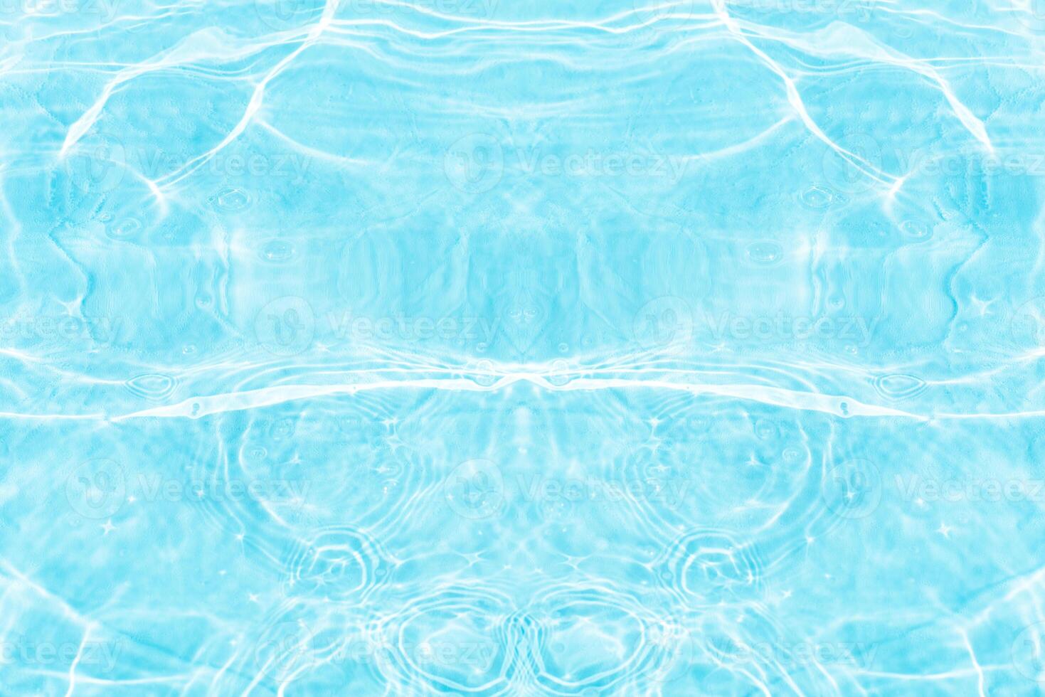 Blue water with ripples on the surface. Defocus blurred transparent blue colored clear calm water surface texture with splashes and bubbles. Water waves with shining pattern texture background. photo