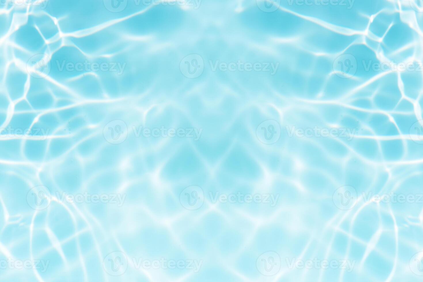 Bluewater waves on the surface ripples blurred. Defocus blurred transparent blue colored clear calm water surface texture with splash and bubbles. Water waves with shining pattern texture background. photo